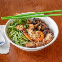 46. Vermicelli with Chicken, Shrimp,and Egg Rolls · Fourty six is a steamed vermicelli bowl. It is served mixing with bean sprouts, chopped cucu...
