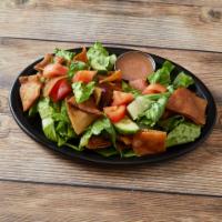 Fattoush Salad · Lettuce, tomatoes, cucumber, and pita chips