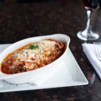LASAGNA · Made from scratch with handmade pasta layers, béchamel, meat sauce, mozzarella and parmesan ...