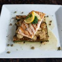 SALMON PICCATA · Salmon prepared in a lemon caper white wine sauce served on seasonal vegetables and mashed p...