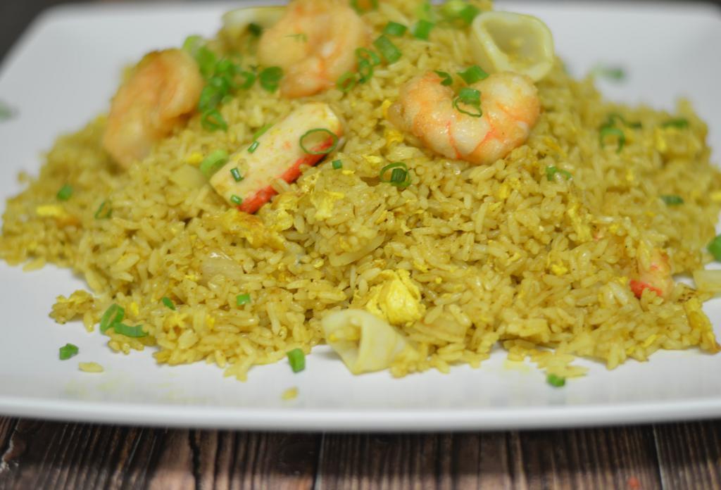 Curry Seafood Fried Rice · Shrimp, calamari, scallop, crabmeat.