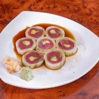 Lotus Roll · Fresh tuna, avocado wrapped in cucumber layers and served with spicy ponzu sauce.