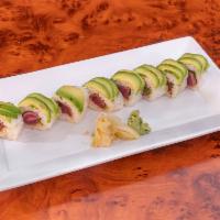 Cowboy Roll · Steak cooked to your liking and green onions, topped with avocado and sweet wasabi sauce.
