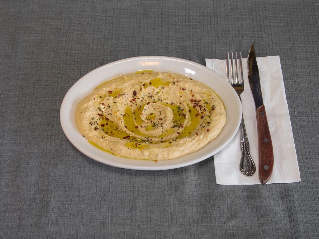 Hummus · Made fresh daily with our secret recipe that puts an Afghan twist on this traditional Mediterranean dish.