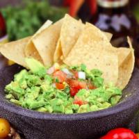 17. Fresh Guacamole · Served to order and freshly made with pico de gallo.