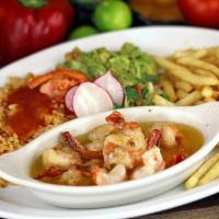 13. Camarones al Mojo de Ajo · Shrimp in garlic sauce, rice, french fries and guacamole. Served with a cup of albondigas so...