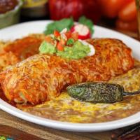 46. Burrito Grande Combo · Choice of meat. Wet burrito topped with melted cheese, sour cream and guacamole, served with...