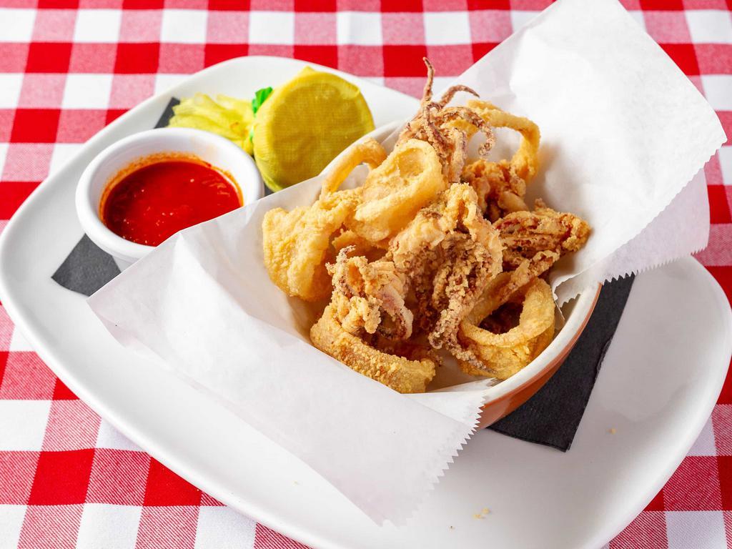 Calamari Fritti · Fresh calamari lightly dusted, fried to a golden brown, served with side of marinara.