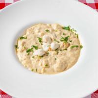 Cream of Crab Soup · Perfectly creamy, with a touch of sherry and topped with jumbo lump crabmeat