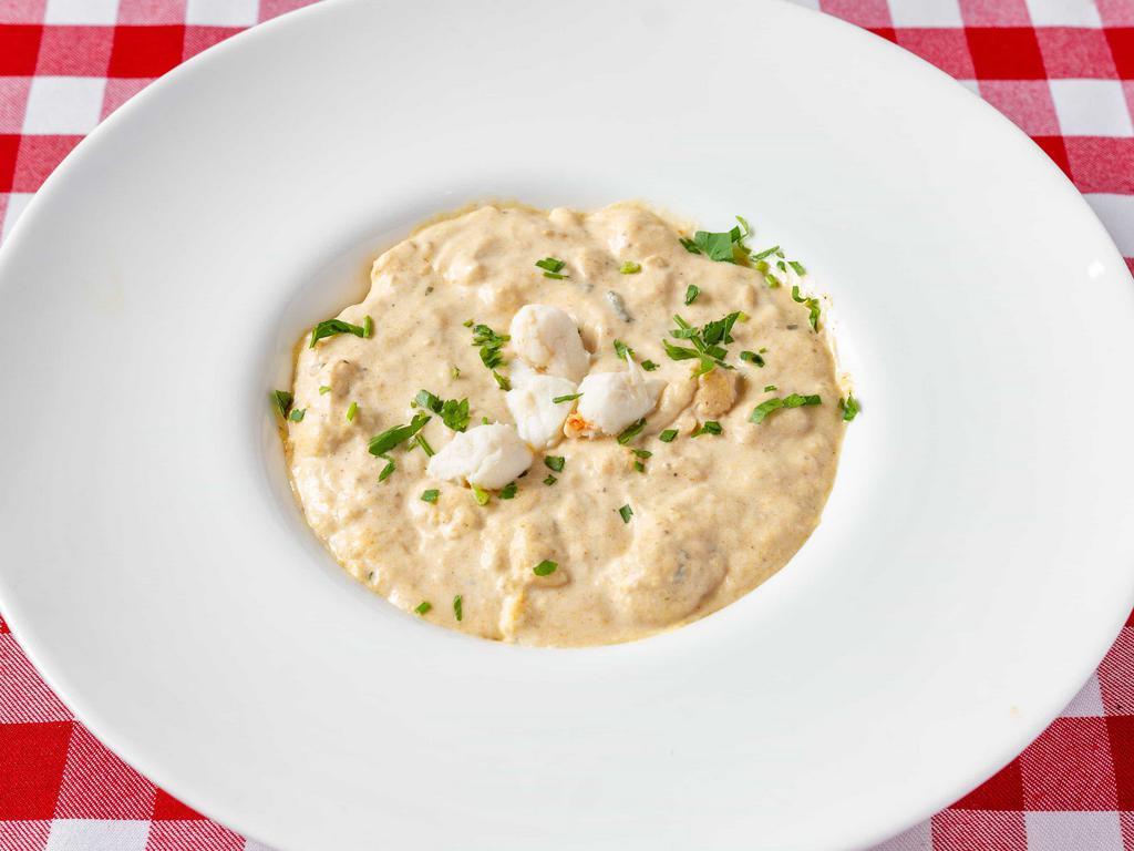 Cream of Crab Soup · Perfectly creamy, with a touch of sherry and topped with jumbo lump crabmeat