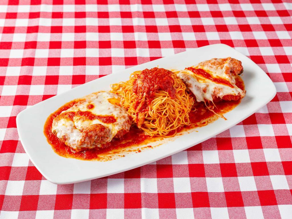 Pollo Parmigiana · Lightly-breaded chicken breast with zesty tomato sauce and mozzarella, baked to perfection.