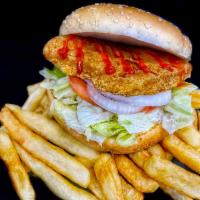 Crispy Chicken Sandwich with Fries · Crispy Chicken Sandwich with, lettuce, tomato, sliced onions, ketchup, and mayonnaise on a s...