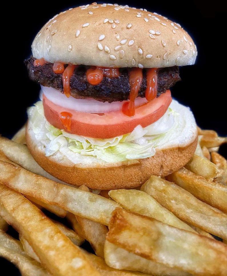 Hamburger with Fries · A grilled halal beef patty seasoned with lettuce, tomato, sliced onions, ketchup, and mayonnaise on a seeded bun with french fries.