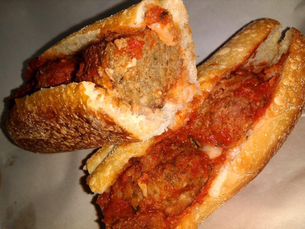 Home-Made Meatball Sandwich · all beef- hand rolled daily-simmered in authentic tomato sauce.