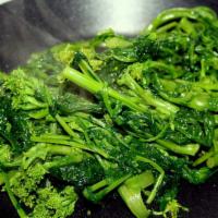 Broccoli di Rabe · sauteed w garlic, olive oil and just a hint of paprika.  Not bitter at all . just sooo good! 