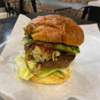 The Vegan · Beyond Burger, Lettuce, Tomato, Avocado, Sautéed Onion, BBQ Sauce and Chimichurri. Fries not...
