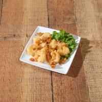 Honey Walnut Shrimp · Crispy shrimp over lettuce, glazed with honey walnut sauce and topped with walnuts.