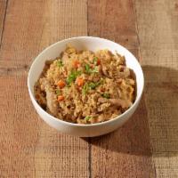 Pork Fried Rice · Steamed rice stir fried with eggs, peas, carrots and green onions. 