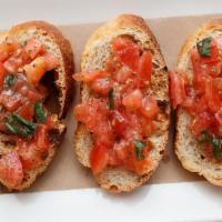 Bruschette Pomodoro · Grilled Bread (Three) Topped with Cherry Tomatoes, Extra Virgin Olive Oil, Basil.