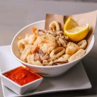 Frittura di Mare (fried calamari and shrimp) · Fried Calamari with Shrimp, Side of Spicy Tomato Sauce.