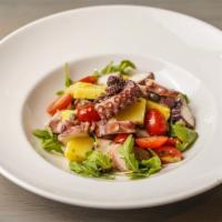 Polpo alla Insalata · Seared Mediterranean Octopus, Soft Potatoes, Gaeta olives, Cherry Tomatoes, Arugula, Capers.