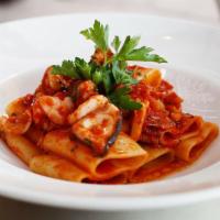 Scialatielli allo Scoglio · Scialatielli Pasta With Calamari, Octopus, Golf Shrimp, Manila Clams, Light Tomato Sauce