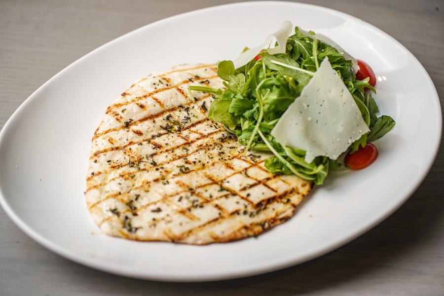 Paillard di Pollo · Pounded Organic Grilled Chicken Breast Served with Arugula and Cherry Tomato Salad.