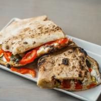 Grigliato Pizza-Sandwich · Grilled Zucchini, Red Bell Peppers, Eggplants, Ricotta Cheese.