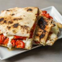 Contadino Pizza-Sandwich · Grilled Chicken, Roasted Red Bell Peppers, Fresh Mozzarella.