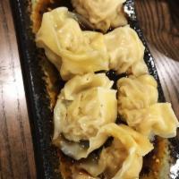 Wonton Dumpling · Pork and shrimp in a Szechuan chili oil.