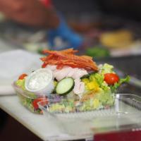 Chef Salad · Romaine lettuce, turkey and ham, shredded jack cheese, cucumber, cherry tomatoes, onion, oli...