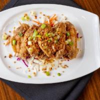J's Crispy Chicken Wing · Crispy chicken wings wok fried with garlic, green onion and chinese spices