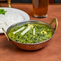 Saag Panir · Creamed spinach with our freshly made panir cheese. Gluten free, nuts free and contains dairy.