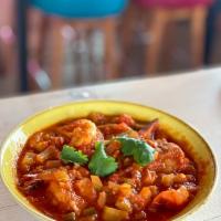 Camarones ala Diabla · Sauteed shrimp in a spicy red sauce with Jasmine rice + cilantro