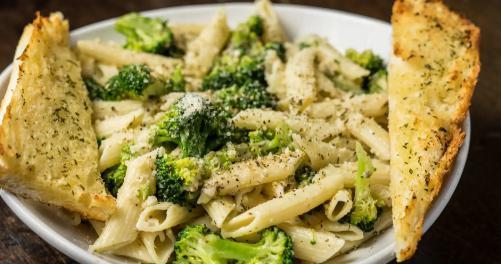 Penne Broccoli · Pasta with olive oil, lots of garlic and broccoli. A generous portion of pasta, prepared in the old world Italian tradition. Served with marinara or meat sauce, breadsticks and grated cheese.