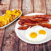4 Slices of Bacon and Eggs · 4 Slices of thick, honey cured bacon and 2 large fresh eggs, served any style.
