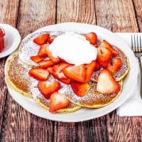Strawberry Pancakes · In season. Buttermilk pancakes topped with fresh strawberries, powdered sugar, and our fresh...