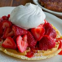 Fresh Strawberry Waffle · In season. Our golden Belgian waffle dusted with powdered sugar then topped with fresh straw...