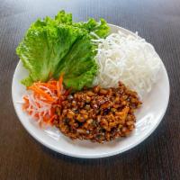 Lettuce Wrap · Dice chicken breast stired fried with jicama and onions.  Served with lettuce, crispy noodle...