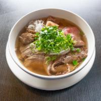 Pho Dac Biet · Pho combination. Meatball, raw beef, tendon, brisket, brisket, tripe.