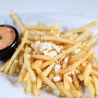 GREEK FRIES · Greek seasoning, feta cheese, Bella's fry sauce.