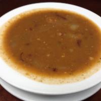 Potaje de Colorados Miercoles Special · Red beans stew.