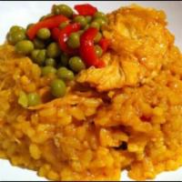 Arroz con Pollo Miercoles Special · Chicken and yellow rice and sweet plantains.