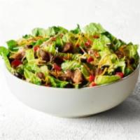 Salad Meal · Not your typical bowl of greens. Pile your favorite ingredients on a bed of chopped romaine ...