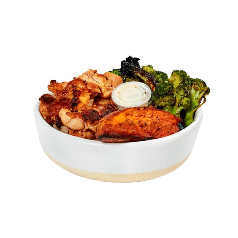 Classic Dig Bowl · Charred chicken, roasted sweet potatoes, charred broccoli with lemon, brown rice, garlic aioli on the side. Contains soy.