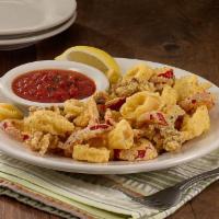 Calamari (Sm) · Tender, lightly breaded and friend with red cherry peppers, served with Prince marinara