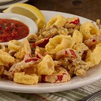 Calamari (Lg) · Tender, lightly breaded and friend with red cherry peppers, served with Prince marinara