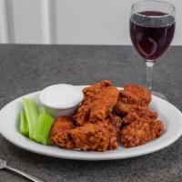 Wings · 10 pieces. Buffalo, BBQ, or teriyaki (bleu cheese and celery with buffalo only).