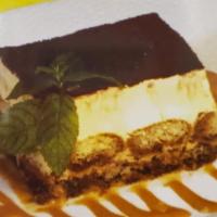 Deluxe Tiramisu · Served with a touch of mascarpone and espresso.