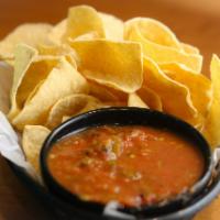 Chips and Salsa · Small bag of chips with 8 oz. salsa for 2 people.